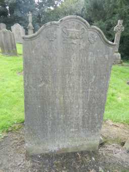 Oblique view of Headstone with Moulded Shaped Top and Low Relief Urn (5) September 2016